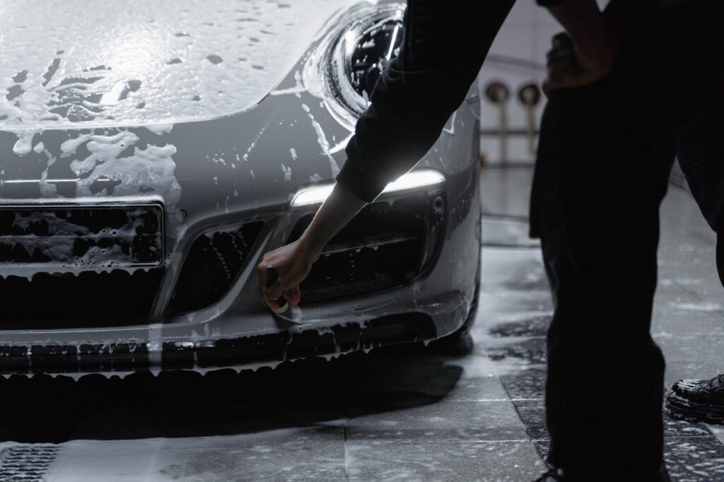 A Person Cleaning the Car